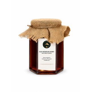 Fyonli Raw Mountain Honey jar, wild forest sourced, front view on white background